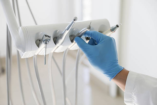 Professional Tooth Extraction technician working in Woodside, CA
